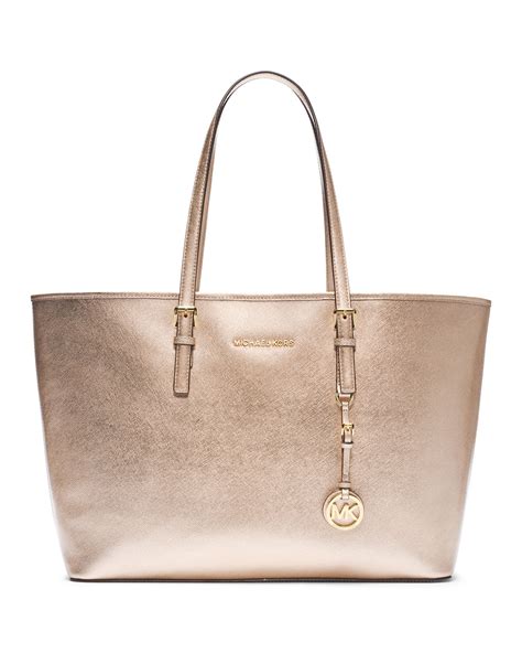 michael kors tas jet set travel tote gold black gold